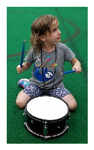 Girl playing drum at concert petting zoo 2a Girl playing drum at concert petting zoo 2a